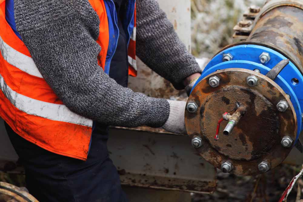 technicians preparing CIPP lining equipment